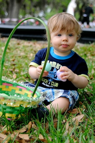 One-year-old Brooke Coy holds two eggs he found during the Easter egg hunt held during the annual Eggstravaganza event held at Marrington Plantation on Joint Base Charleston-Weapons Station April, 16. The event was hosted by Morale, Welfare and Recreation in conjunction with the Month of the Military child, and provided a fun-filled day for the whole family. (U.S. Navy photo/Mass Communication Specialist 1st Class Jennifer Hudson)