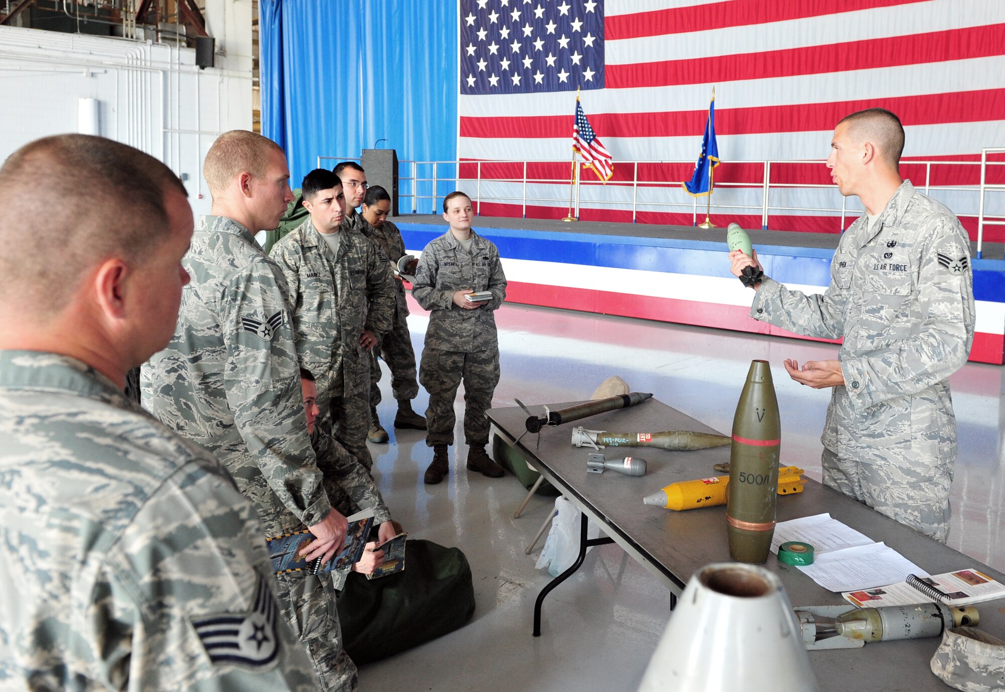 SHAW AIR FORCE BASE, S.C. - Shaw Airmen participate in the Ability to Survive and Operate Rodeo in hanger 1200 April 19, 2011. The rodeo gave Airmen the opportunity to practice hands-on war time scenarios for self-aid and buddy care, decontamination, reporting procedures and unexploded explosive ordinance identification.(U.S. Air Force photo/Airman 1st Class Tabatha L. Duarte (Released))
