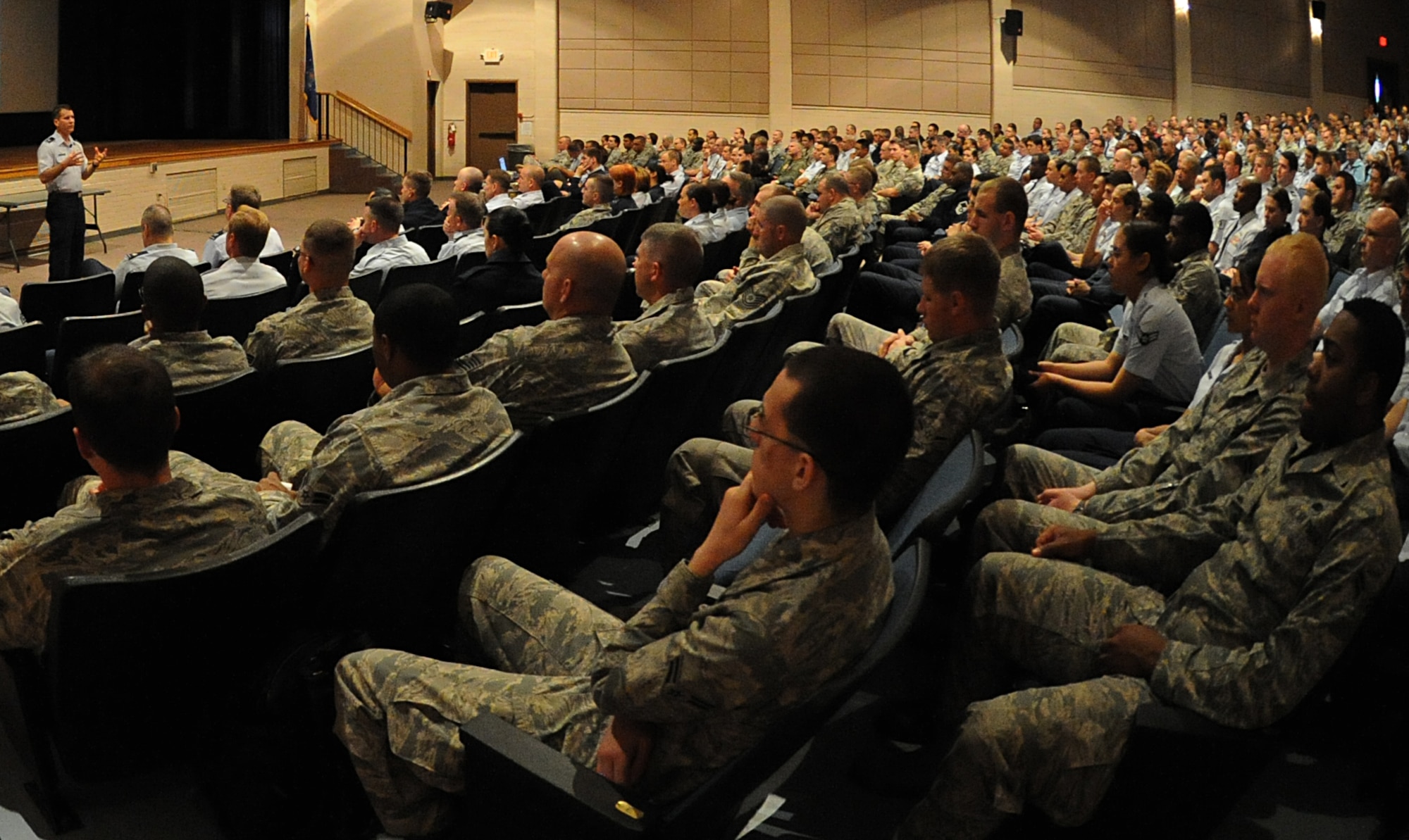 Col. Jamie Crowhurst, 22nd Air Refueling Wing commander, speaks at a commander’s call held in the base theater April 18, 2011, McConnell Air Force Base, Kan. During the three commander’s calls, the commander recognized Team McConnell members for their outstanding work. Team McConnell members recently won a combined total of 29 Air Mobility Command and Air Force level-awards. (U.S. Air Force photo/Airman 1st Class Katrina M. Brisbin) 
