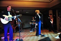 MINOT, N.D. – The Heartland of America Band Nightwing performs at the 23rd annual International Military Ball April 16 at the Holiday Inn here. The Chair of the Minot Area Chamber of Commerce, and the commanders of the 5th Bomb Wing and 91st Missile Wing, sponsored the 23rd annual International Military Ball which also featured the 26th Field Regiment Royal Canadian Artillery Pipes and Drums group and dignitaries from both the United States and Canada. (U.S. Air Force photo/Senior Airman Jesse Lopez)