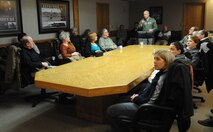 MINOT AIR FORCE BASE, N.D. – Col. Christopher Coffelt, 91st Missile Wing vice commander, gives a mission brief to a group of Canadian visitors during a base tour here April 16. The tour was part of the festivities surrounding the 23rd annual International Military Ball, held at the Minot Holiday Inn.  The Chair of the Minot Area Chamber of Commerce, and the commanders of the 5th Bomb Wing and 91st MW, sponsored the ball, which featured the Heartland of America Band, Night Wing, and dignitaries from both the United States and Canada. (U.S. Air Force photo/Tech. Sgt. Thomas Dow)