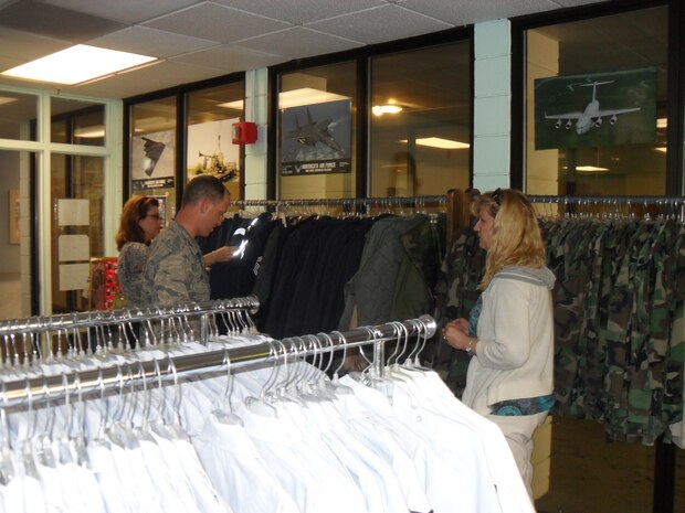 Col. Tony Clavenna and Fern Rhodes (left), shop and talk with Marie Leydig during the Joint Base Charleston Consignment Shop open house, April 14. Colonel Clavenna is the 437th Maintenance Gropu commander, Ms. Rhodes is a retired Air Force Master Sgt. and Mrs. Leydig is the Consignment Shop manager. (courtesy photo)