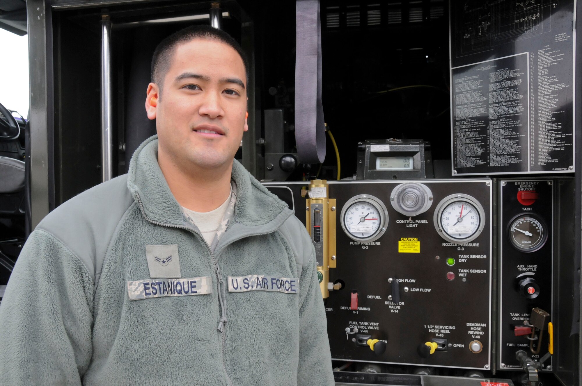 U.S. Air Force Airman 1st Class Christian Estanique, a Fuels Apprentice with the 35th Logistics Readiness Squadron from Misawa AB, and an Oak Harbor, Wash.-native, finishes a fueling operation of a C-130 Hercules aircraft that delivered cargo as part of the humanitarian assistance that was flown in here to support Operation Tomodachi on March 30, 2011.