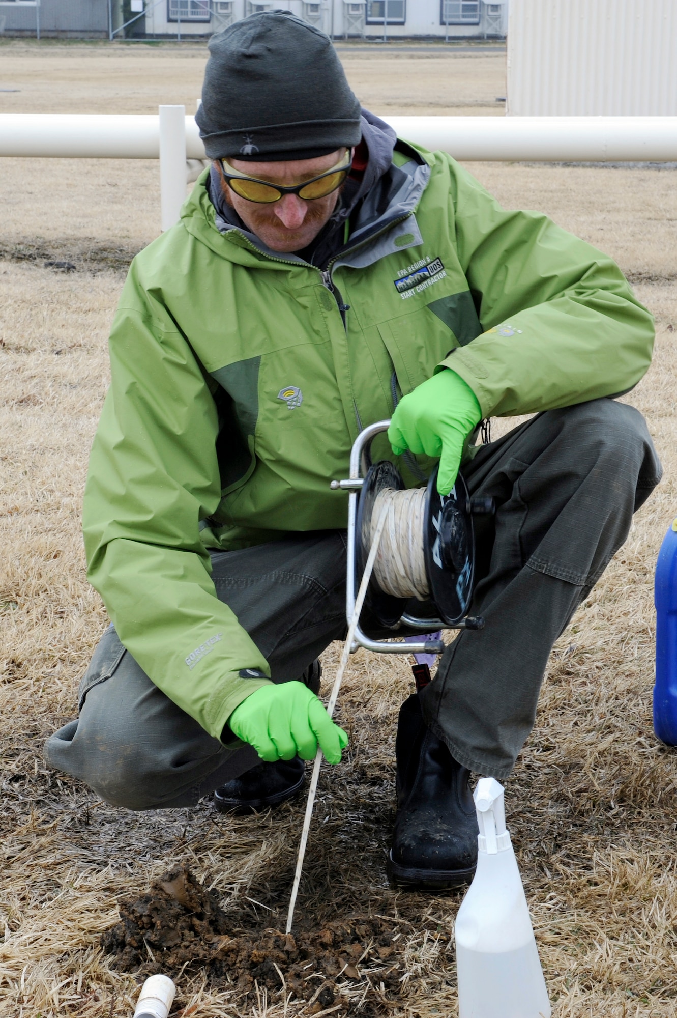 MISAWA AIR BASE, Japan -- Nathan Williams, contractor, measures the depth of a make-shift well 
20 April. Six proposed locations will be drilled with a depth measuring between six and 12.5 meters in 
order to take a sample of ground water. (U.S. Air Force photo by Staff Sgt. Marie Brown\Released)

