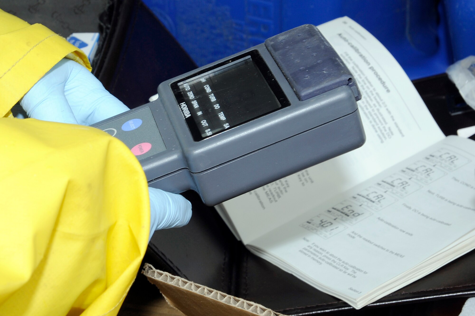 MISAWA AIR BASE, Japan -- Mayumi Fukushima, a contractor, calibrates a multimeter water 
checker 20 April. The multimeter is used for measuring pH, conductivity and temperature of water 
samples. (U.S. Air Force photo by Staff Sgt. Marie Brown\Released)
