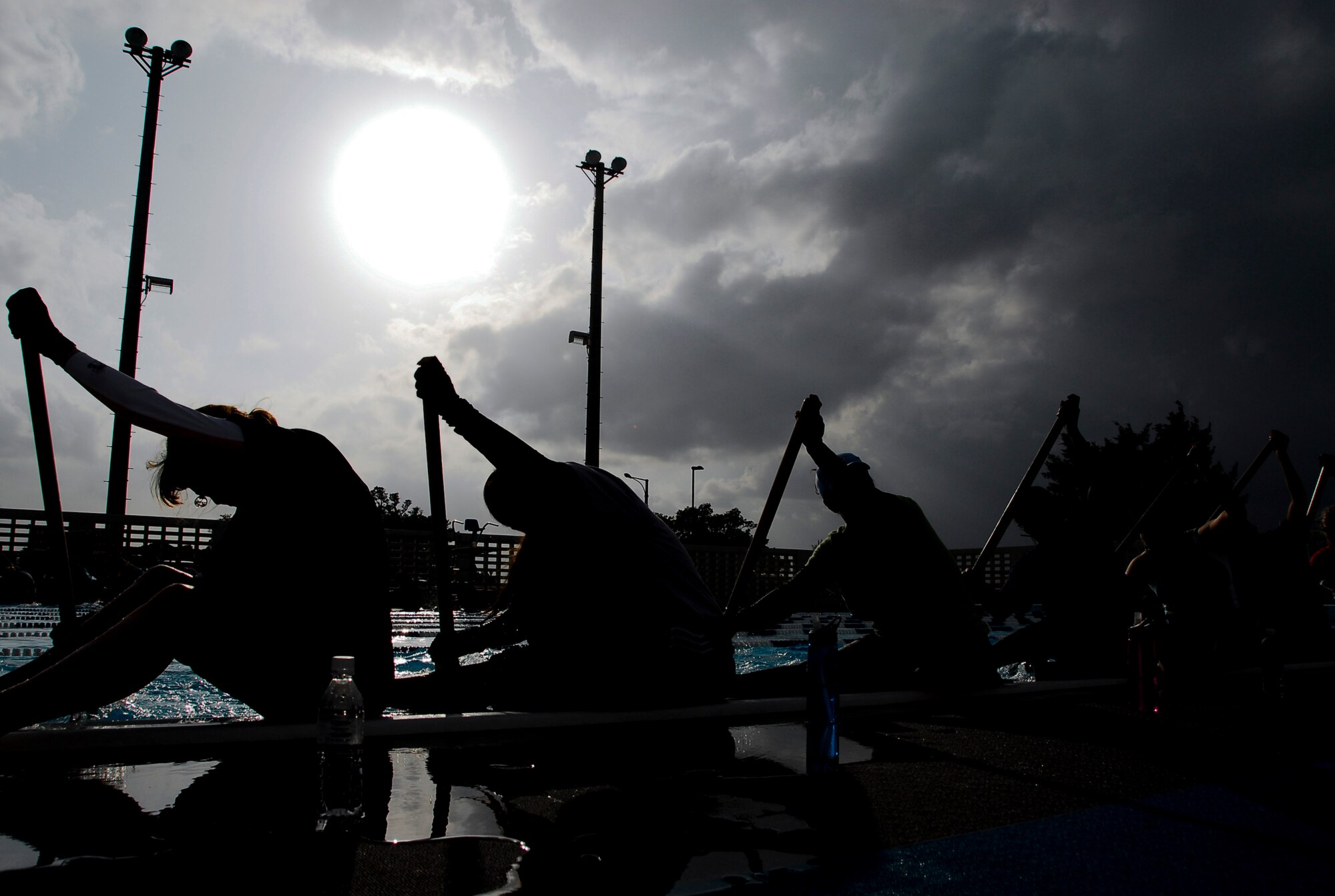 Members of the women’s Dragon Boat racing team practice at Kadena’s Fairchild pool, April 5. The 37th annual Dragon Boat Race will host both women’s and men’s teams, made up of active duty, civilian and dependent volunteers against local Okinawan teams and teams from other U.S. services. (U.S. Air Force photo/ Airman 1st Class Maeson L. Elleman)