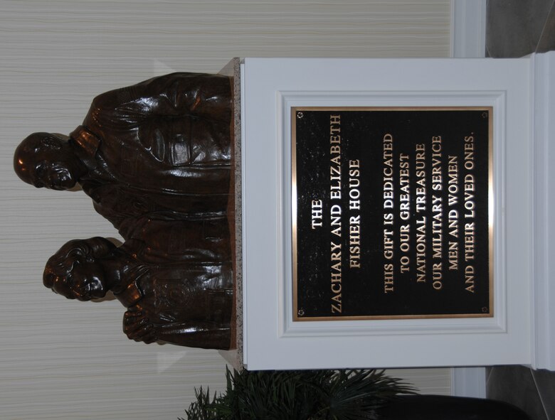 Inside the new home is a statue of Mr. and Mrs. Fisher.  A ribbon cutting ceremony for the new Fisher House will be held April 29, 2011 at 10 a.m. Those with base access are welcome to attend the ceremony. A shuttle service will be provided from the Arnold House parking lot at 9 a.m. (U.S. Air Force photo/Ben Strasser) 
