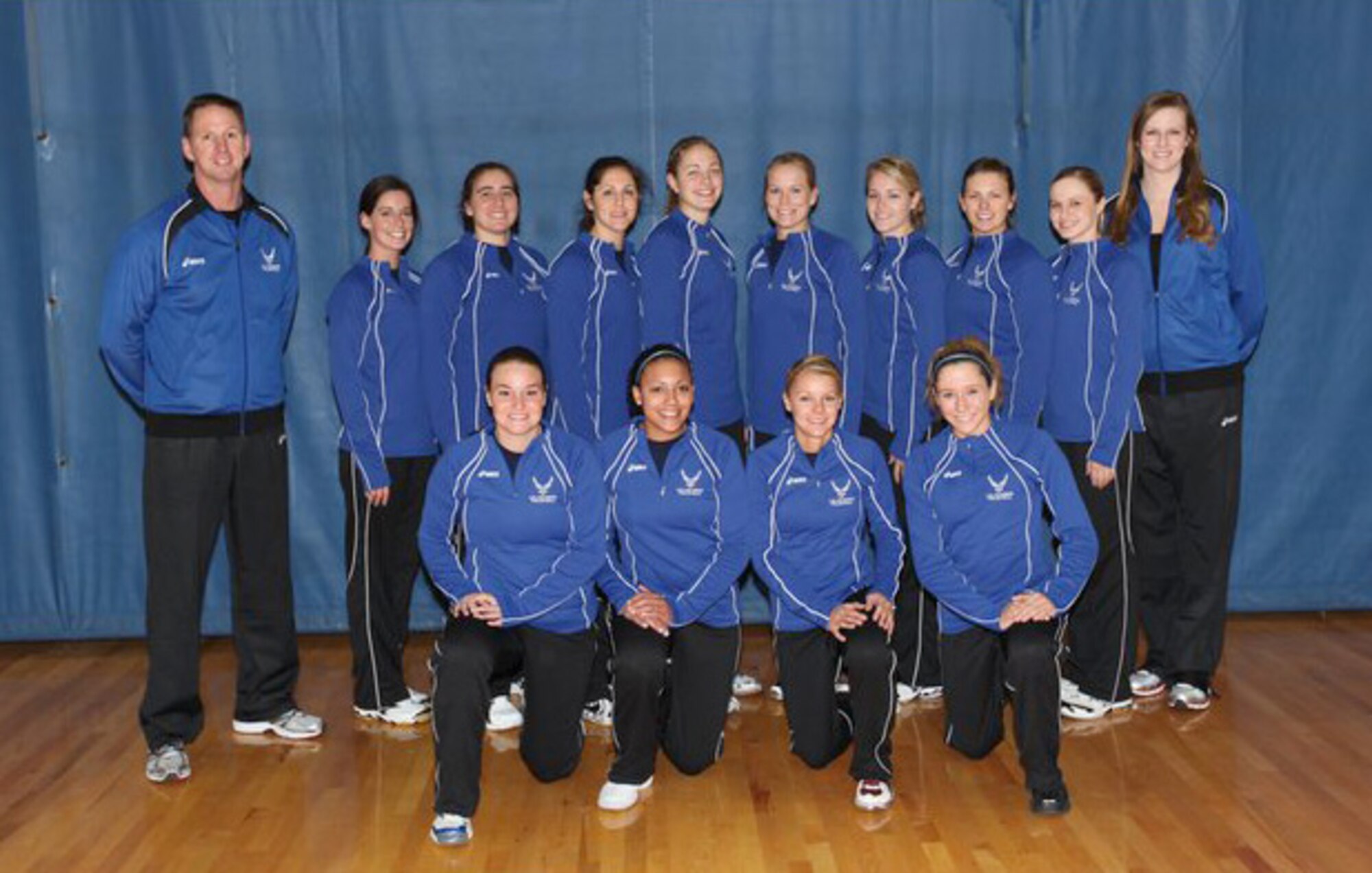 MARINE CORPS AIR STATION CHERRY HILL, N.C. -- (Second from left in back row) 1st Lt. Virginia Aguilar, 97th Medical Support Squadron medical readiness and medical information systems flight commander, poses with the 2011 All Air Force Women’s Volleyball Team. “It’s a great opportunity because even coming in, there’s no difference between great officer or enlisted players,” Lieutenant Aguilar said. “We’re all teammates coming together for this common experience. It’s a great experience meeting people from all over the world.” (Courtesy photo)