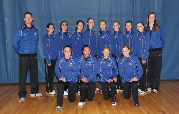 MARINE CORPS AIR STATION CHERRY HILL, N.C. -- (Second from left in back row) 1st Lt. Virginia Aguilar, 97th Medical Support Squadron medical readiness and medical information systems flight commander, poses with the 2011 All Air Force Women’s Volleyball Team. “It’s a great opportunity because even coming in, there’s no difference between great officer or enlisted players,” Lieutenant Aguilar said. “We’re all teammates coming together for this common experience. It’s a great experience meeting people from all over the world.” (Courtesy photo)