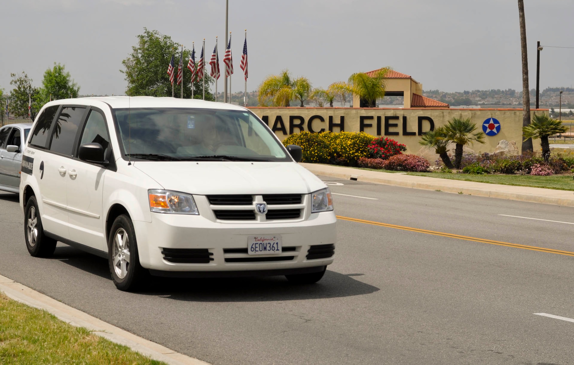 A rideshare van leaves March Air Reserve Base, Calif., April 18, 2011. Paul Pitman, rideshare coordinator for the base, said the rise in gas prices has prompted dozens of March service members and civilian employees to join vanpools.  (U.S. Air Force photo/ Linda Welz)