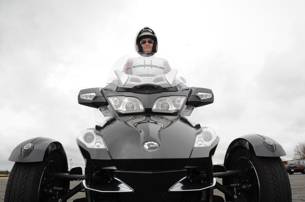 Ms. Shawn Mayo, 92nd Air Refueling Wing Public Affairs, purchased this three-wheeled bike following her accident in 2008. Here she is pictured at Fairchild Air Force Base, Wash., on April 15, 2011. Previous to becoming a licensed motorcycle rider, she had always been a passenger on someone else’s bike and wanted the experience of being in her own control. (U.S. Air Force Photo)