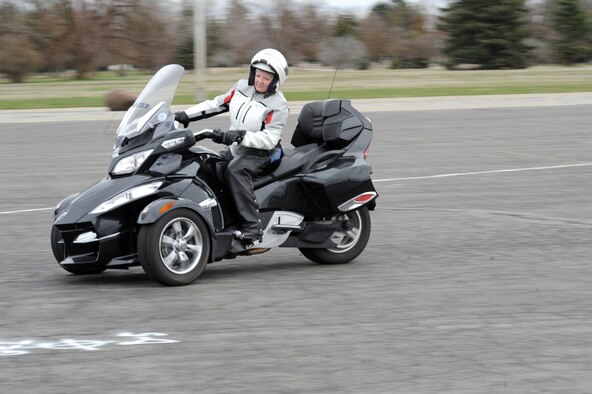 Ms. Shawn Mayo, 92nd Air Refueling Wing Public Affairs, sits a top her one-year-old CanAm Spyder Roadster RTS three-wheeled motorcycle at Fairchild Air Force Base, Wash., on April 15, 2011. After her motorcycle accident in 2008, she decided that riding a 3-wheeled motorcycle better suited her skill level. She highly encourages everyone who rides a motorcycle to attend any safety courses available to them. (U.S. Air Force Photo)