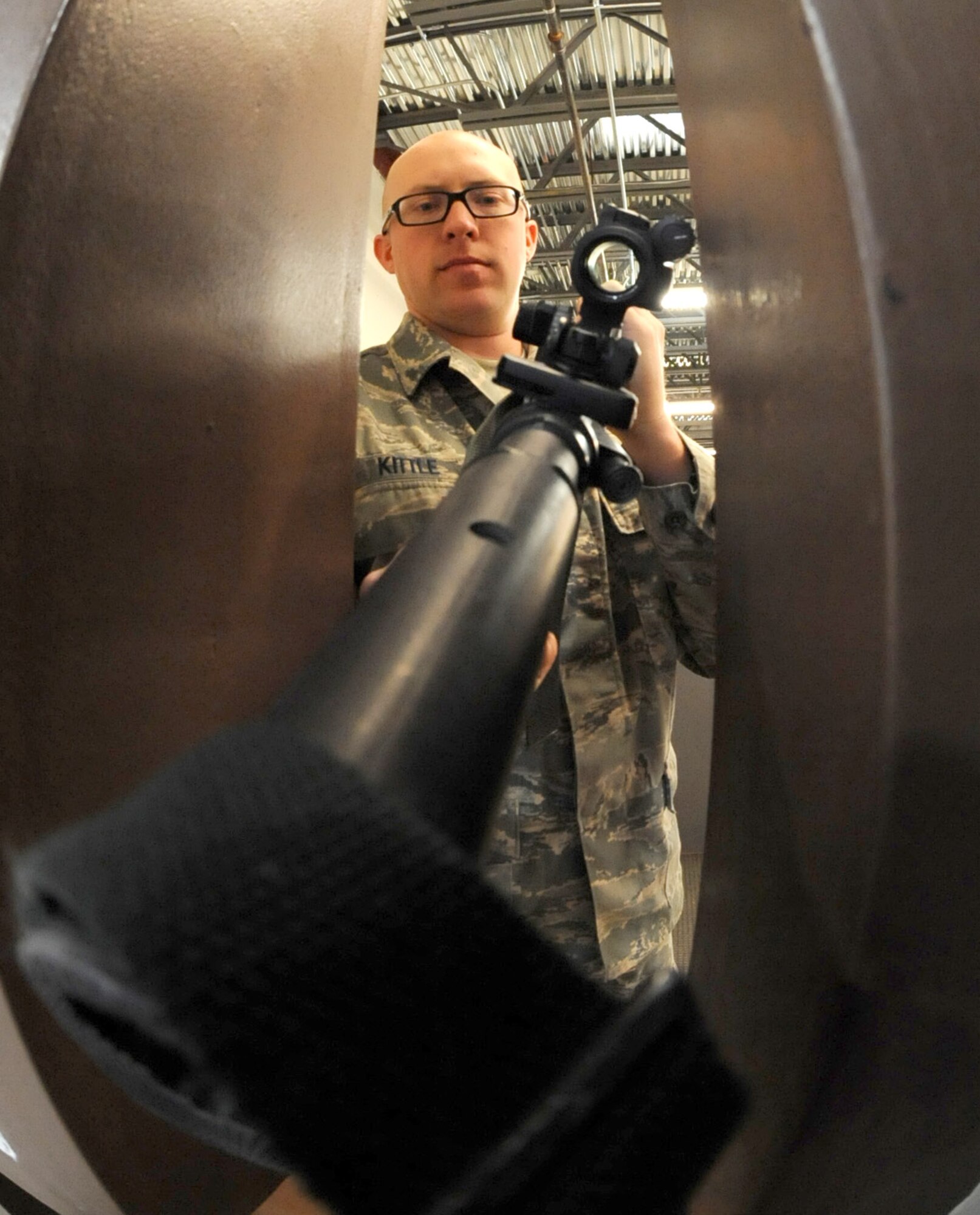 Senior Airman Cody Kittle, 22nd Logistics Readiness Squadron weapons vault technician, prepares an M-4 Carbine for issue at the weapons vault April 19, 2011, McConnell Air Force Base, Kan. The 22nd LRS maintains and provides equipment to McConnell Airmen for training exercises and real-world deployments. (U.S. Air Force photo/Staff Sgt. Dallas Edwards)