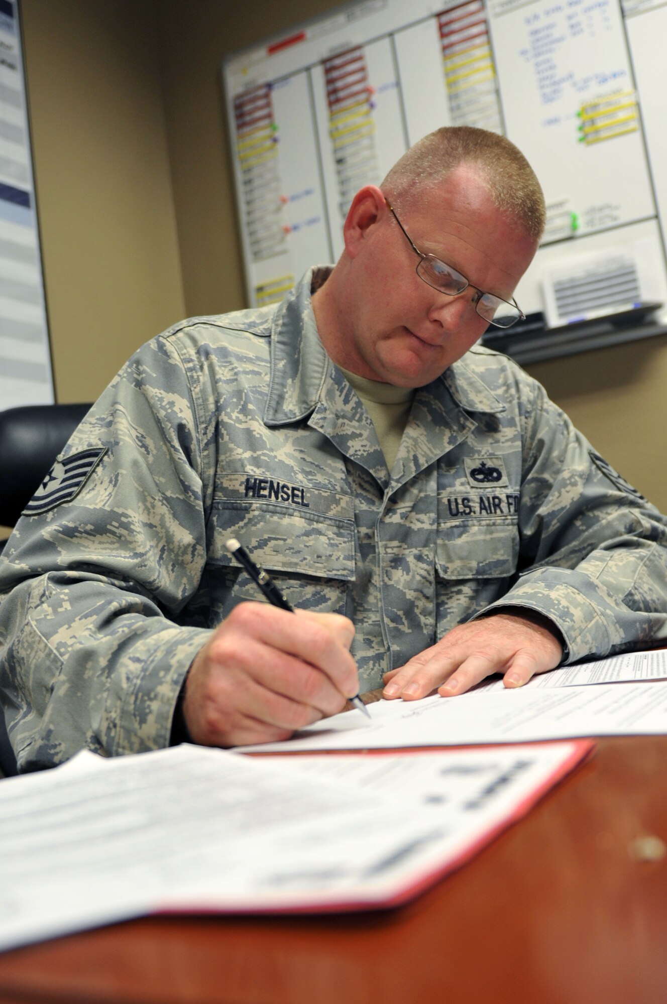 Tech. Sgt. Jason Hensel, a 314 Aircraft Maintenance Squadron assistant section chief, reviews unit documents April 18, 2011, at Little Rock Air Force Base, Ark. The Hooks, Texas, native is a unit compliance inspection monitor, coordinating with squadron and group program managers to scrutinize 27 self-inspection checklists and incorporating 883 compliant line items. Sergeant Hensel’s attention to detail was essential to his unit and wing, earning an “Excellent” rating during the 2011 Air Education and Training Command unit compliance inspection. (U.S. Air Force photo by Airman 1st Class Rusty Frank)