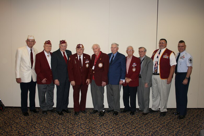 PIGEON FORGE, Tenn. - Chief Master Sgt. Donald E. Felch, right, commandant of the Paul H. Lankford Enlisted Professional Military Education Center at McGhee Tyson Air National Guard Base, poses with members of the Tennessee American Ex-Prisoners of War at their annual banquet at the Music Road Hotel here, April 9, 2010.  Felch was a guest speaker at the event.  (U.S. Air Force photograph by Katherine Felch/Released)