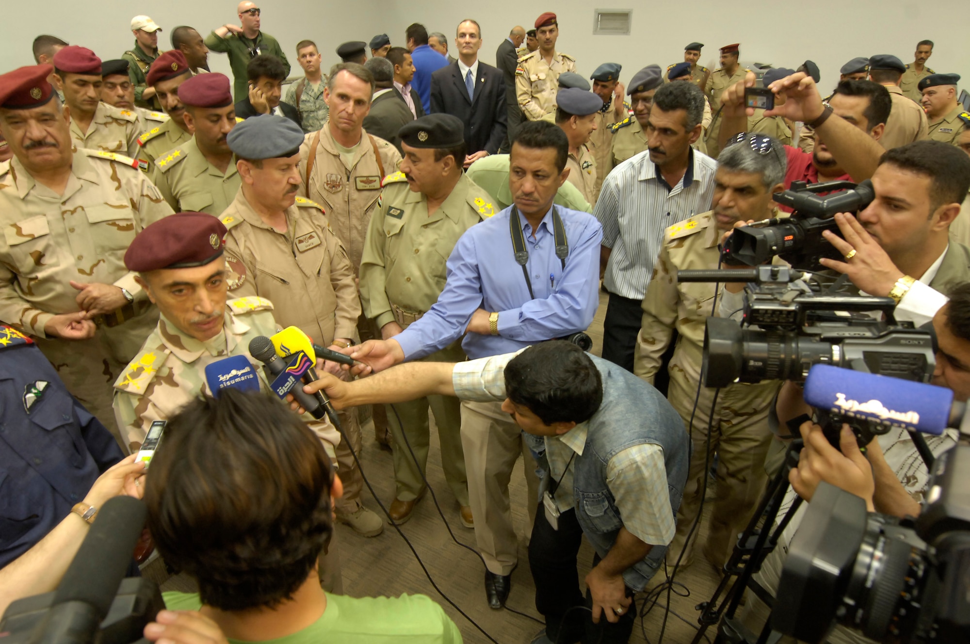 VICTORY BASE COMPLEX, Iraq – Gen. Babakir Zebari, Chief of Staff, Joint Headquarters, conducts an interview with multiple Iraqi media outlets during the grand opening ceremony of the new Iraqi air operations center April 21. The grand opening was just one of the many events held in celebration of the Iraqi air force’s 80th birthday. (U.S. Air Force photo by Tech. Sgt. Randy Redman) 