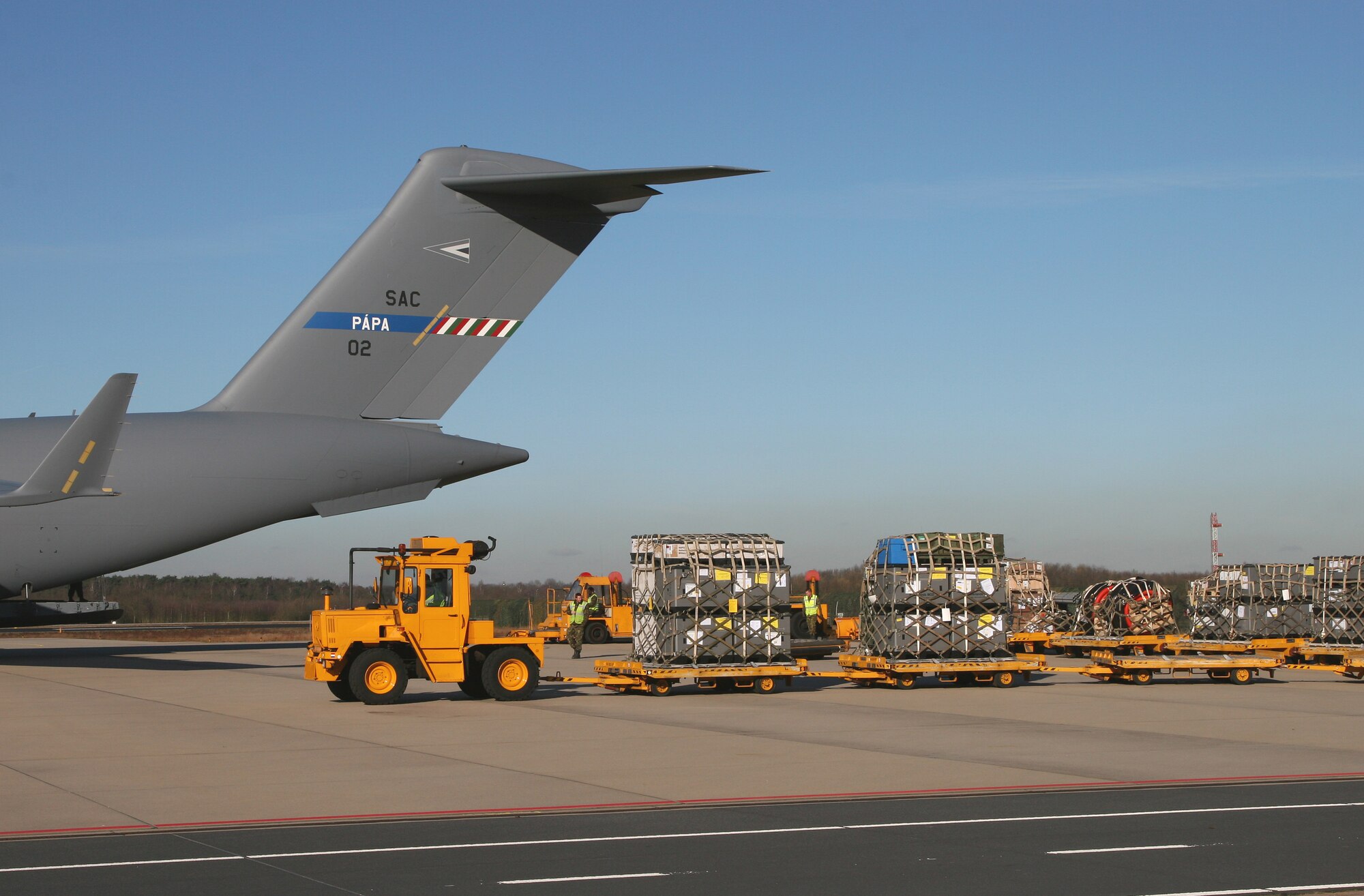 EINDHOVEN, The Netherlands -- After months of coordination, computers once used in various NATO offices found their way to a school in Afghanistan. Dubbed Aladdin's Lamp, a multi-national crew from the Heavy Airlift Wing transported more than 24 computers and 130 flat screen monitors from Eindhoven, The Netherlands, to Kandahar. From there, the equipment made its way to a final destination in Kabul and were donated to SOZO, a non-profit charity organization. The computers are now in a SOZO School, where teachers are educating more than 150 students. (Courtesy photo)