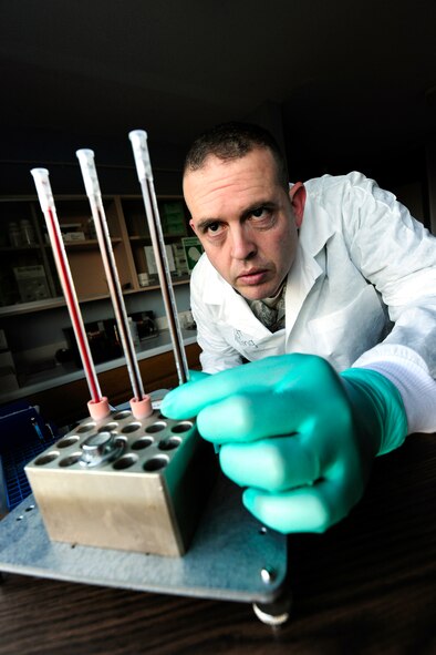 Master Sgt. Ronald Walling, NCOIC Laboratory Services 422nd Air Base Group, analyzes blood to determine sedimentation rate at RAF Croughton.  (U.S. Air Force photo by Tech. Sgt. John Barton)