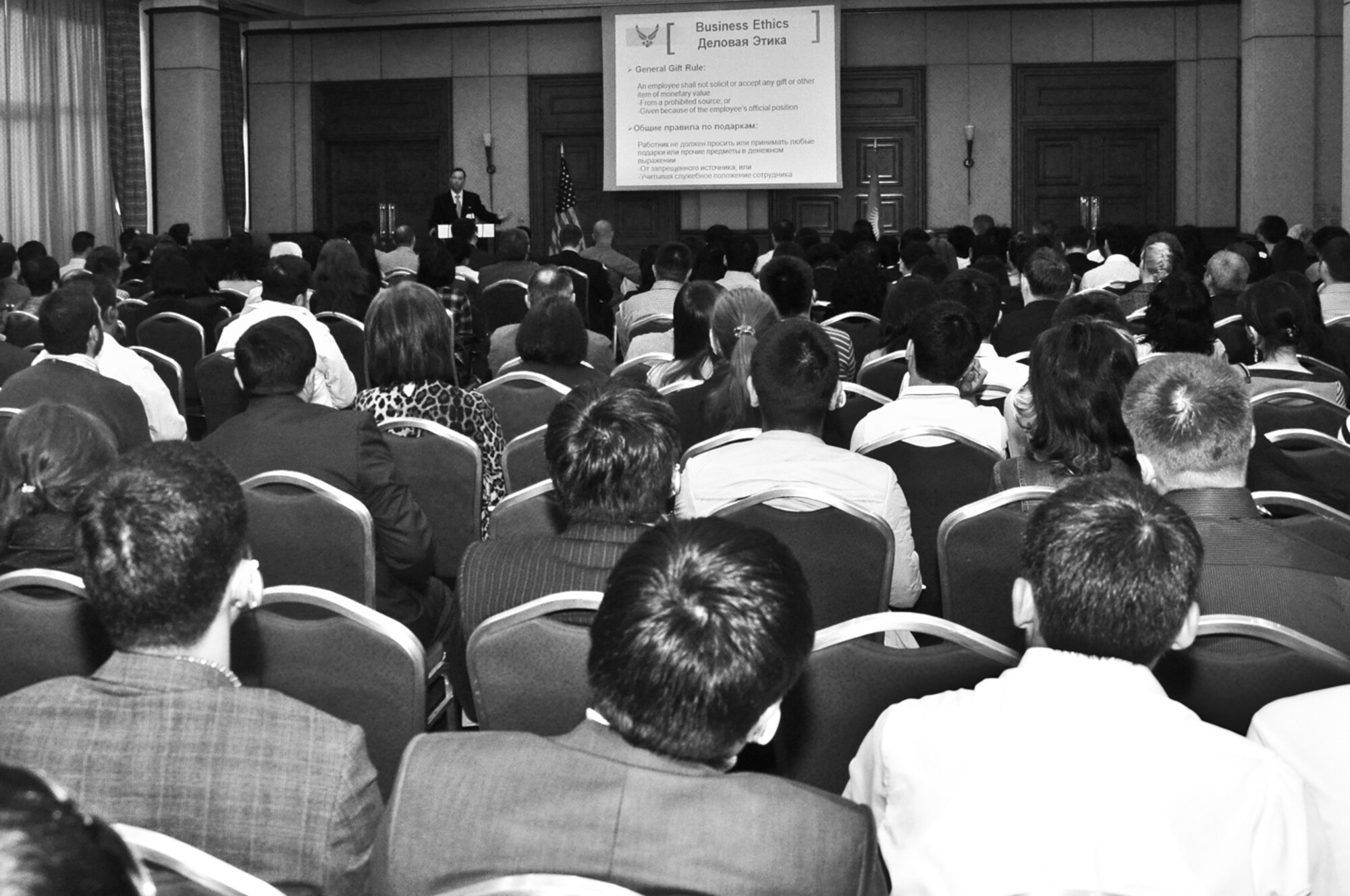 Maj. Sterling Pendleton, 376th Air Expeditionary Wing Judge Advocate, briefs on the subject of business ethics to vendors attending the Transit Center at Manas’ Industry Day event held at the Hyatt Regency Bishkek April 22. The 376th Expeditionary Contracting Squadron holds Industry Day twice a year to inform prospective businesses on the procedures required to qualify as a vendor with the Center. (U.S. Air Force photo/Master Sgt. Daniel Nathaniel)