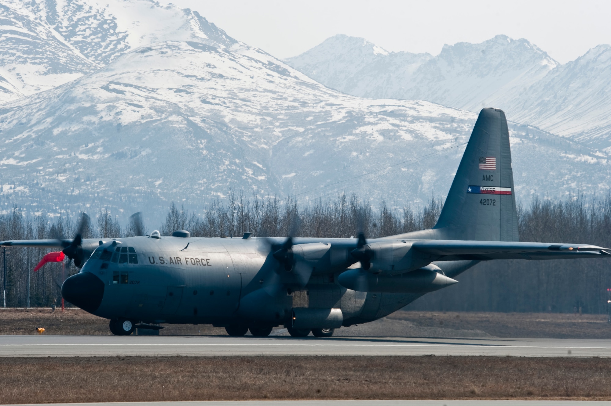 JOINT BASE ELMENDORF-RICHARDSON, Alaska -- A C-130 Hercules prepares to take off April 18. The 39th and 40th Airlift Squadrons from Dyess Air Force Base, Texas have three C-130s and approximately 120 Airmen at JBER for Red Flag-Alaska. RF-Alaska is a Pacific Air Forces-directed field training exercise for the U.S. and coalition forces flown under simulated air combat conditions. It is conducted on the Joint Pacific Alaskan Range Complex, the largest air-ground training complex in America. (Air Force photo/Senior Airman Christopher Gross)