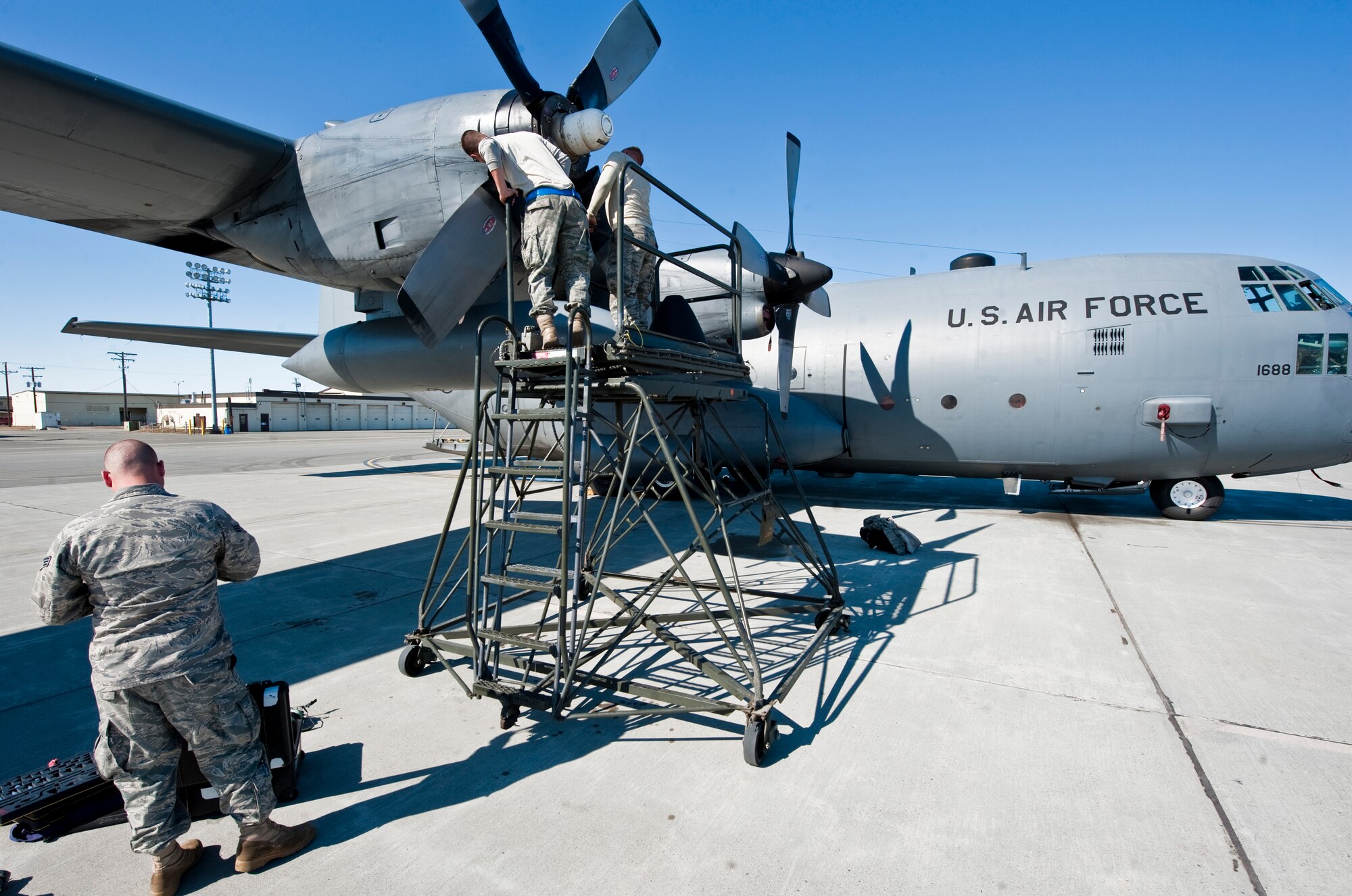 JOINT BASE ELMENDORF-RICHARDSON, Alaska -- Members of the 317th Aircraft Maintenance Squadron work on a propeller of a C-130 Hercules April 15. The 317th AMXS is part of the 39th and 40th Airlift Squadrons from Dyess Air Force Base, Texas. The squadron has three C-130s and approximately 120 Airmen at JBER for Red Flag-Alaska. RF-Alaska is a Pacific Air Forces-directed field training exercise for the U.S. and coalition forces flown under simulated air combat conditions. It is conducted on the Joint Pacific Alaskan Range Complex, the largest air-ground training complex in America. (Air Force photo/Senior Airman Christopher Gross)