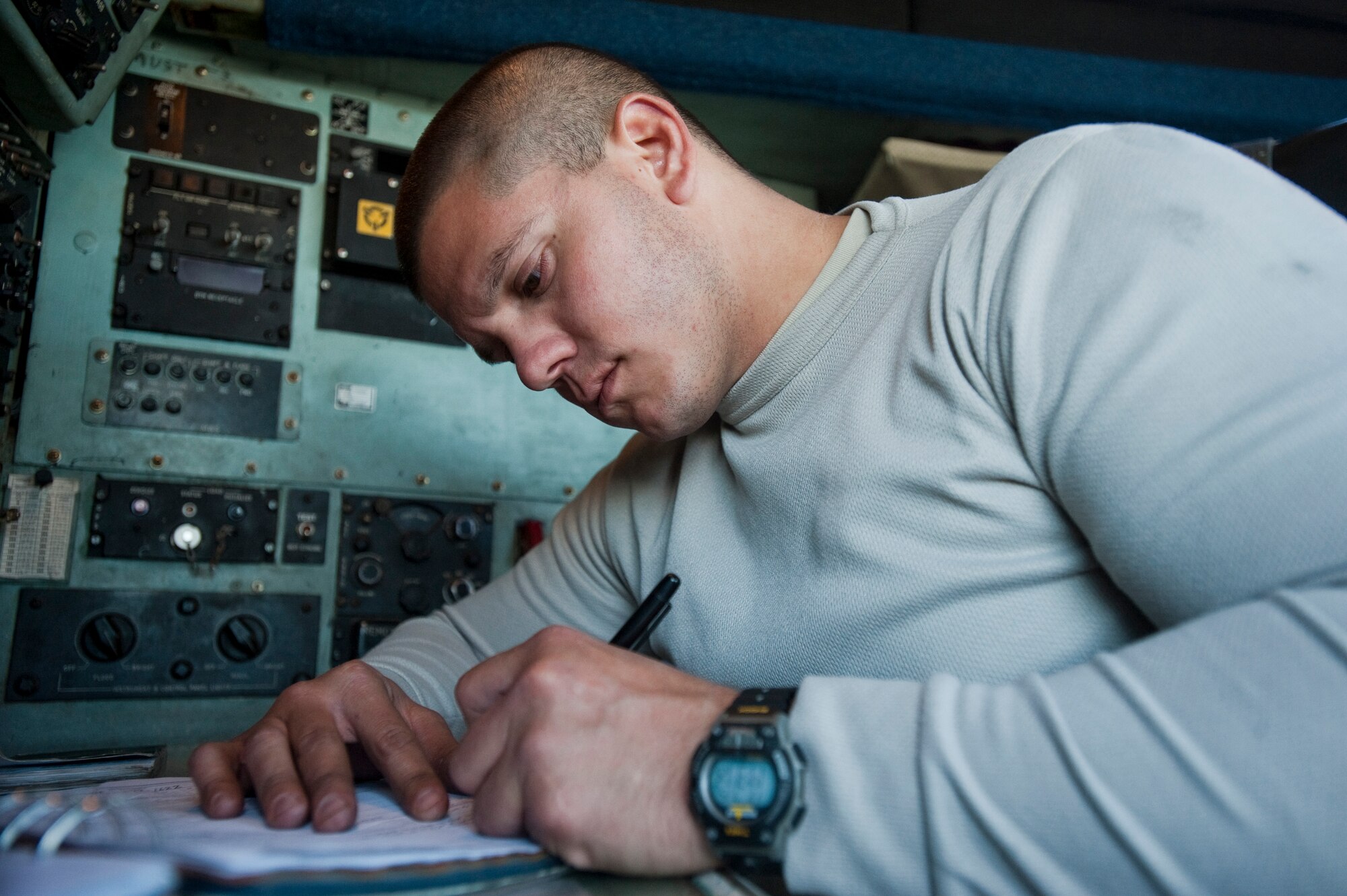 JOINT BASE ELMENDORF-RICHARDSON, Alaska -- Staff Sgt. Daniel Deherrera, 317th Aircraft Maintenance Squadron, goes down a checklist inside of a C-130 Hercules April 15. The 317th AMXS is part of the 39th and 40th Airlift Squadrons from Dyess Air Force Base, Texas. The squadron has three C-130s and approximately 120 Airmen at JBER for Red Flag-Alaska. RF-Alaska is a Pacific Air Forces-directed field training exercise for the U.S. and coalition forces flown under simulated air combat conditions. It is conducted on the Joint Pacific Alaskan Range Complex, the largest air-ground training complex in America. (Air Force photo/Senior Airman Christopher Gross)