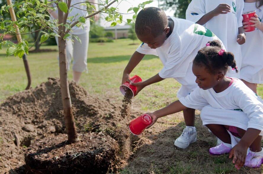 MOODY AIR FORCE BASE, Ga. -- Children from the Child Development Center pre-school class plant a tree at Tree City on Earth Day April 22. The base scheduled several activities for Earth Day throughout the week, including speaking at local schools, the Youth Center, the CDC and hosting an Earth Day fun run. (U.S. Air Force photo/Airman 1st Class Douglas Ellis)(RELEASED)
