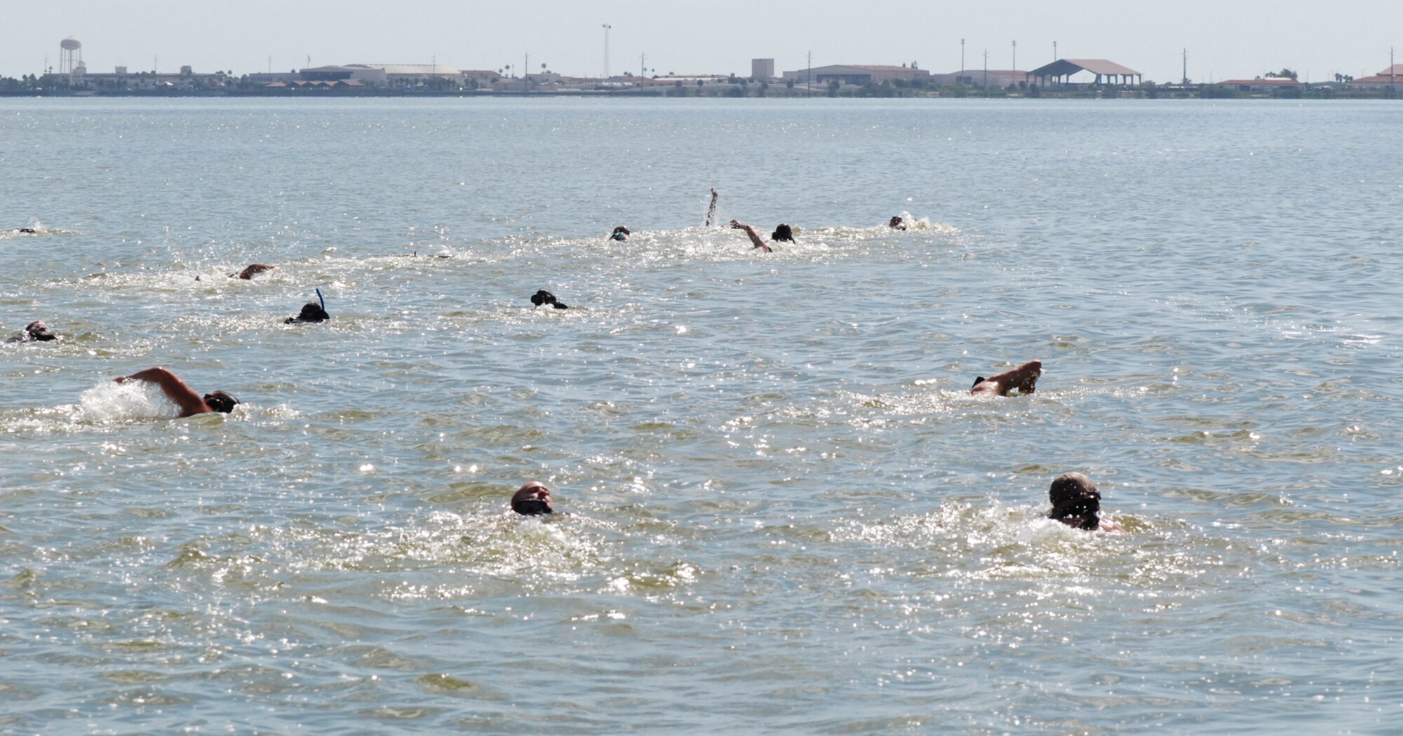 PATRICK AIR FORCE BASE, Fla. -  Pararescuemen from the 920th Rescue Wing here swim across the Banana River east to PAFB April 21, 2011, approximately two miles during a Monster Mash - a fun training exercise geared to build endurance and camaraderie among Special Forces Airmen here. (U.S. Air Force photo/Staff Sgt. Leslie Forshaw)
