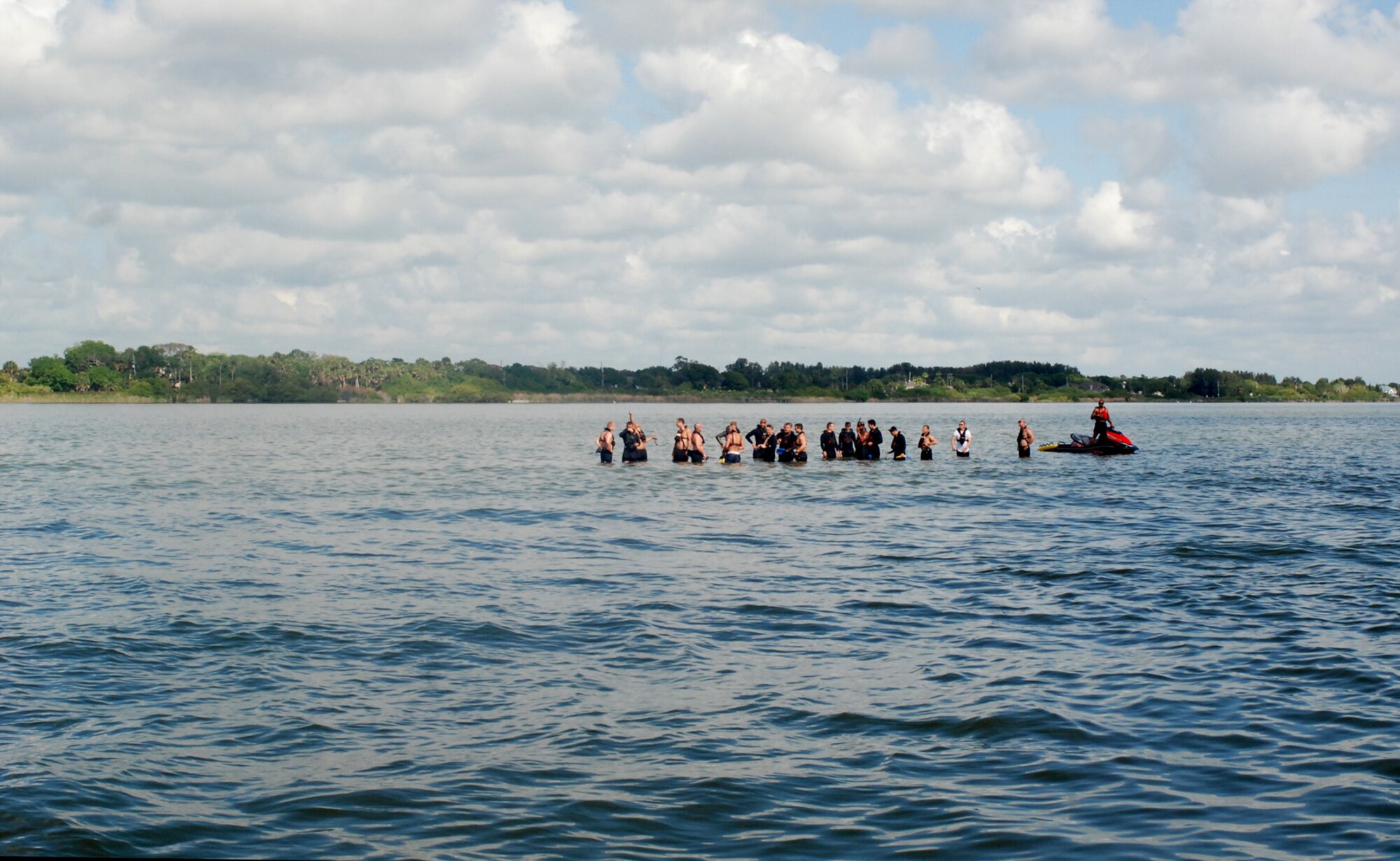 PATRICK AIR FORCE BASE, Fla. -  Pararescuemen from the 920th Rescue Wing here assemble for a swim race on the edge of the Banana River east to PAFB April 21, 2011 during a Monster Mash - a fun training exercise geared to build endurance and camaraderie. (U.S. Air Force photo/Staff Sgt. Leslie Forshaw)