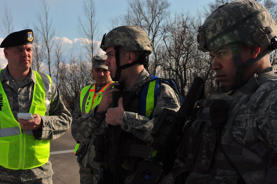 MINOT AIR FORCE BASE, N.D. -- 5th Security Forces Squadron team members respond to a gate-runner exercise at the north gate here April 20. Air Force Global Strike Command’s Minot Air Force Base evaluated the implementation of force protection condition response measures, as well as the readiness and effectiveness of emergency response units during this exercise. (U.S. Air Force photo/ Senior Airman Jesse Lopez)