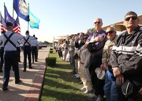 Members of the Air Force Escape and Evasion Society watch the Air Force Basic Military Training graduation parade April 15. (U.S. Air Force photo/Robbin Cresswell)