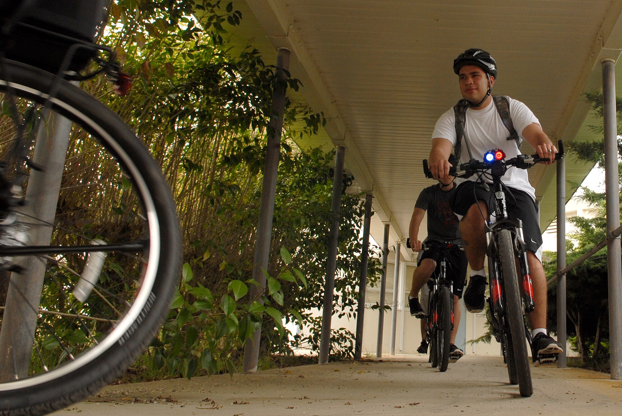 VANDENBERG AIR FORCE BASE, Calif. -- Maneuvering with his fellow trainees, Airman 1st Class David Trevino, a 30th Security Forces Squadron response force member, practices dodging objects during the bike patrol training here Tuesday, April 19, 2011.  The trainees practiced figure eight turns, dodging objects and detaining on the bicycle. (U.S. Air Force photo/Staff Sgt. Andrew Satran) 

 
 
 
 
  