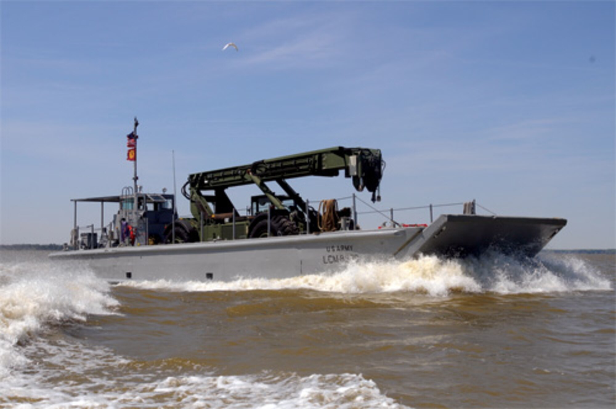 'Sea Dogs' assigned to the 1098th Transportation Detachment, 24th Transportation Battalion, 7th Sustainment Brigade, successfully deliver two Kalmars assigned to the 11th Transportation Battalion, on board the unit's Landing Craft Mechanized vessels April 15. The watercraft sailed from Fort Story to Fort Eustis providing a successful lateral transfer of brigade equipment. (U.S. Army Photo/Sgt. 1st Class Kelly Jo Bridgwater)