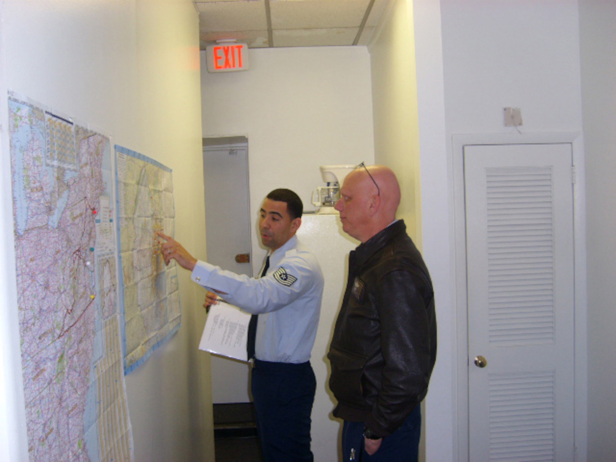 JOINT BASE MCGUIRE-DIX-LAKEHURST, N,J - Reserve recruiter, Tech. Sgt. Michael Boseman, left, shows Col. Michael J. Underkofler, 514th Air Mobility Wing commander, his recruiting zone during the commander's recent visit to two satellite recruiting offices. (U.S Air Force photo/Senior Master Sgt. Alexander Brown)