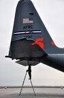 LAUGHLIN AIR FORCE BASE, Texas -- Maintenance personnel from the 302nd Airlift Wing at Peterson Air Force Base, Colo., conduct routine inspections on two C-130s here April 18. The Airmen are currently here in support of the ongoing efforts to contain wildfires in Mexico and Texas. (U.S. Air Force photo by Senior Airman Scott Saldukas)