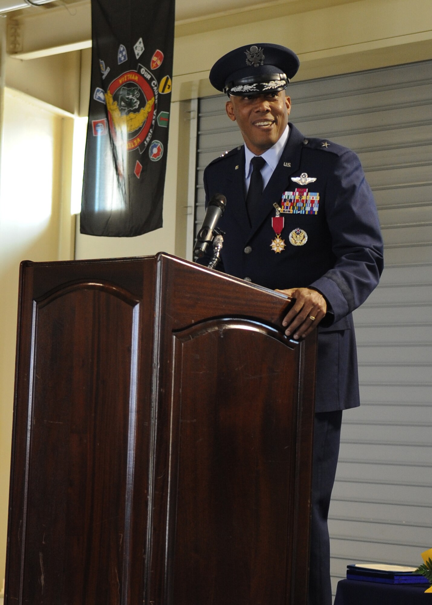 Brig. Gen. Charles Q. Brown Jr. addresses the 31st Fighter Wing for the last time as commander before relinquishing command during the wing change of command ceremony April 22 at Aviano Air Base, Italy. Brig. Gen. Scott J. Zobrist assumed command of the 31st FW. General Brown was selected for reassignment as Deputy Director, Operations (J3), Headquarters U.S. Central Command, MacDill Air Force Base, Fla. (U.S. Air Force photo/Staff Sgt. Nadine Y. Barclay)