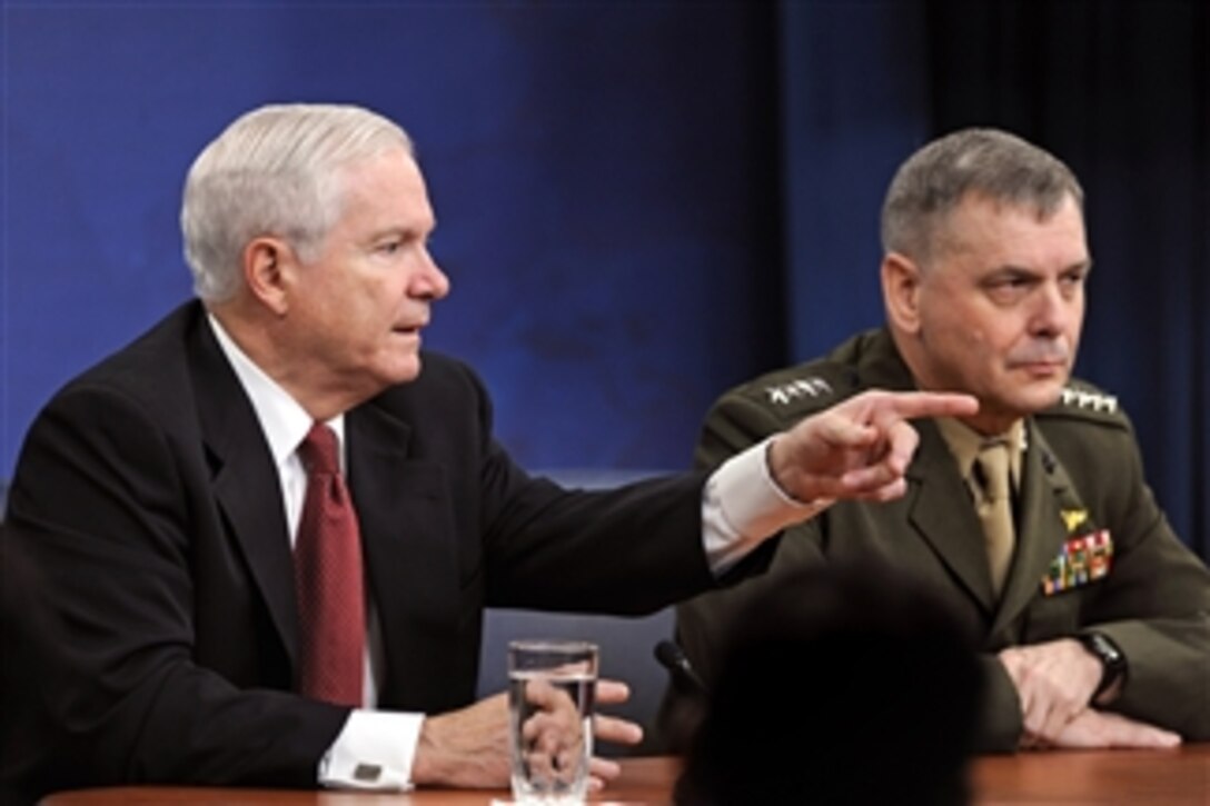 Secretary of Defense Robert M. Gates calls on a reporter for a question during a Pentagon press briefing on April 21, 2011.  Joined by Vice Chairman of the Joint Chiefs of Staff Gen. James E. Cartwright, Gates fielded questions dealing with the situation in Libya and cuts to the defense budget.  