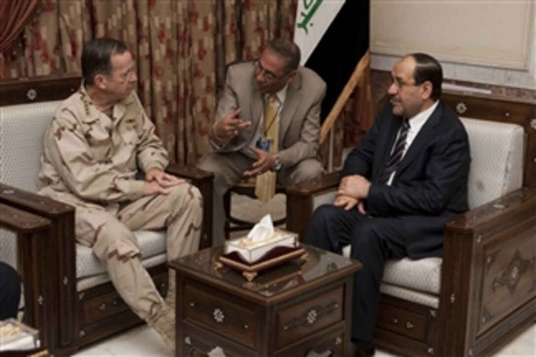 Chairman of the Joint Chiefs of Staff Adm. Mike Mullen meets with Iraqi Prime Minister Nouri al-Maliki in Baghdad, Iraq, on April 21, 2011.  Mullen is in the Central Command area of operation supporting a USO tour to the region and talking to counterparts and service members stationed in the area.  