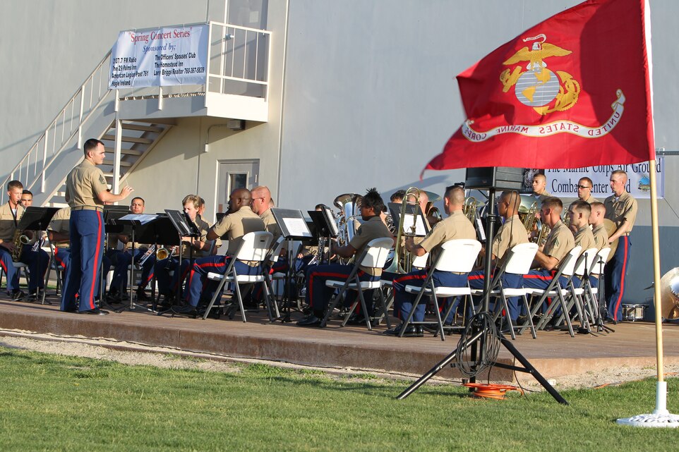 The Combat Center Marine Band performs patriotic songs during the third concert in the Spring Concert Series at Luckie Park in Twentynine Palms, Calif., April 23, 2011.