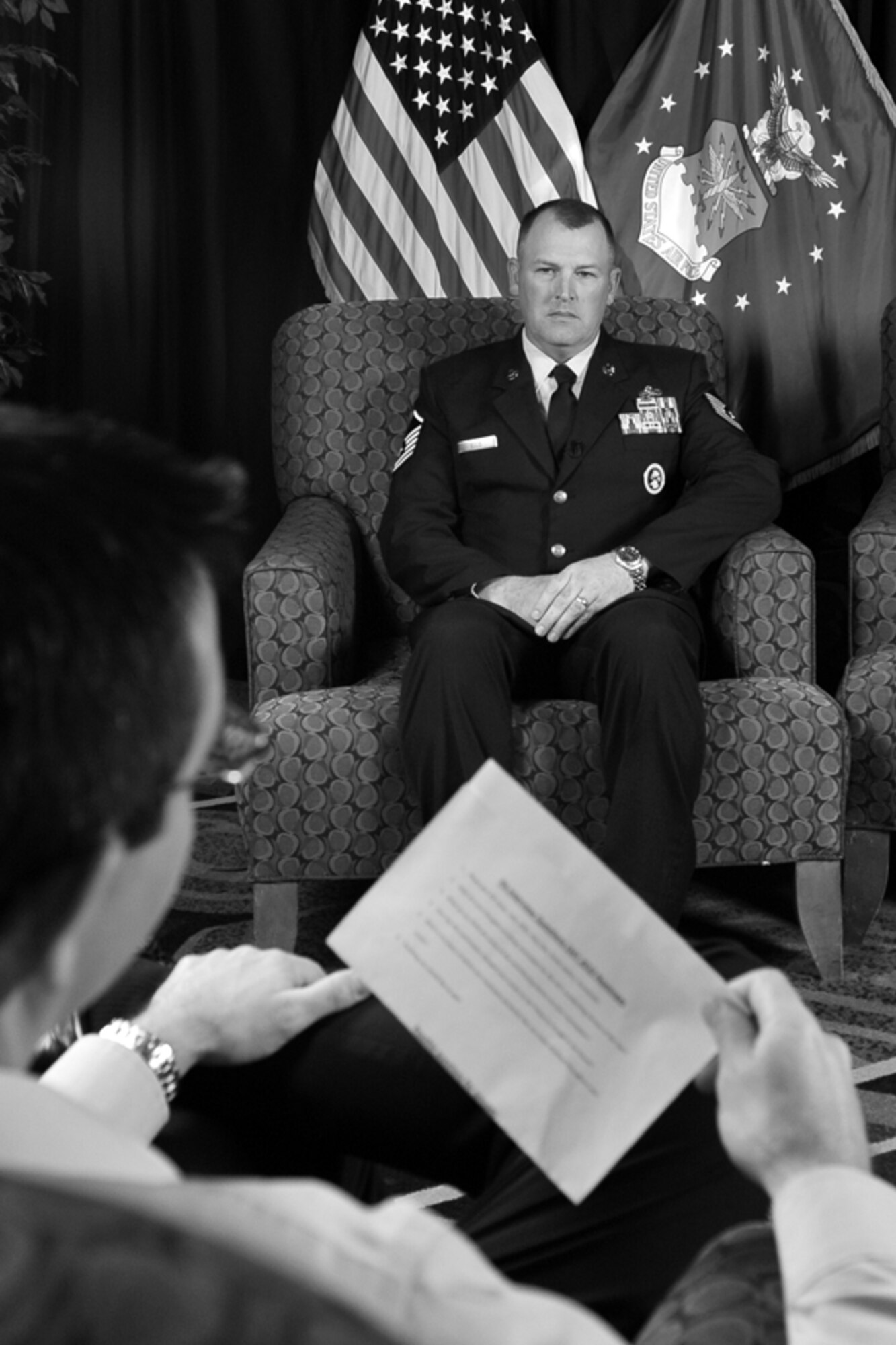 OFFUTT AIR FORCE B ASE, Neb. – Delanie Stafford, audio visual production specialist here, interviews Master Sgt. Christopher Ellis, from Dyess AFB, Texas, during the Air Combat Command Outstanding Airmen of the Year inside the Embassy Suites hotel in Omaha April 18.  Sergeant Ellis was one of the nominees in the outstanding honor guard program manager category. 

U.S. Air Force Photo by charles haymond
[RELEASED] by SrA Peter Danielson
