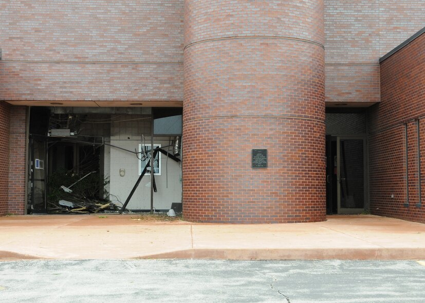 The entrance to the headquarters building at the 131st Bomb Wing Missouri Air National Guard base at Lambert Field-Saint Louis was damaged extensively when a Catagory EF2 tornado hit the area April 22.  No injuries were reported at the base, but damage was extensive to many of the buildings on the south side of the base.  (Photo by Master Sgt Mary-Dale Amison)