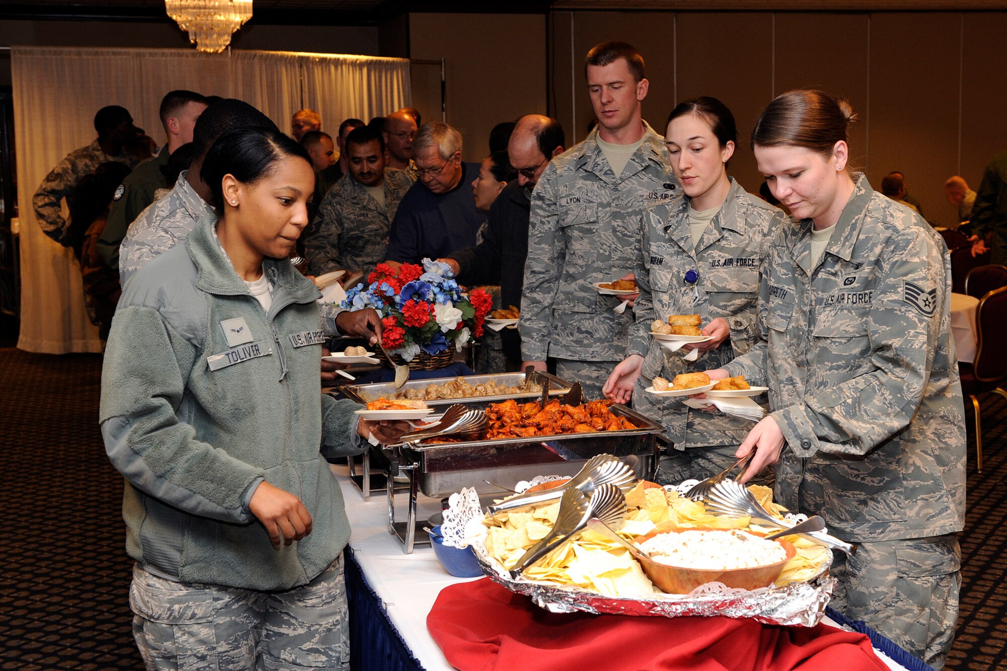 PETERSON AIR FORCE BASE, Colo. – It was time to celebrate and feast when the 21st Space Wing hosted a “Post Operational Readiness Inspection Reception” April 14, 2011, at The Club. Col. Stephen N. Whiting, 21st SW commander, said he wanted to “thank everyone for their hard work” during the 23-day ORI, which evaluated the wing’s ability to perform wartime or contingency missions. The wing earned a “Satisfactory” rating and also had the most professional performers, the most professional teams and the most identified strengths listed in an ORI in Air Force Space Command in recent years. (U.S. Air Force photo/Craig Denton)