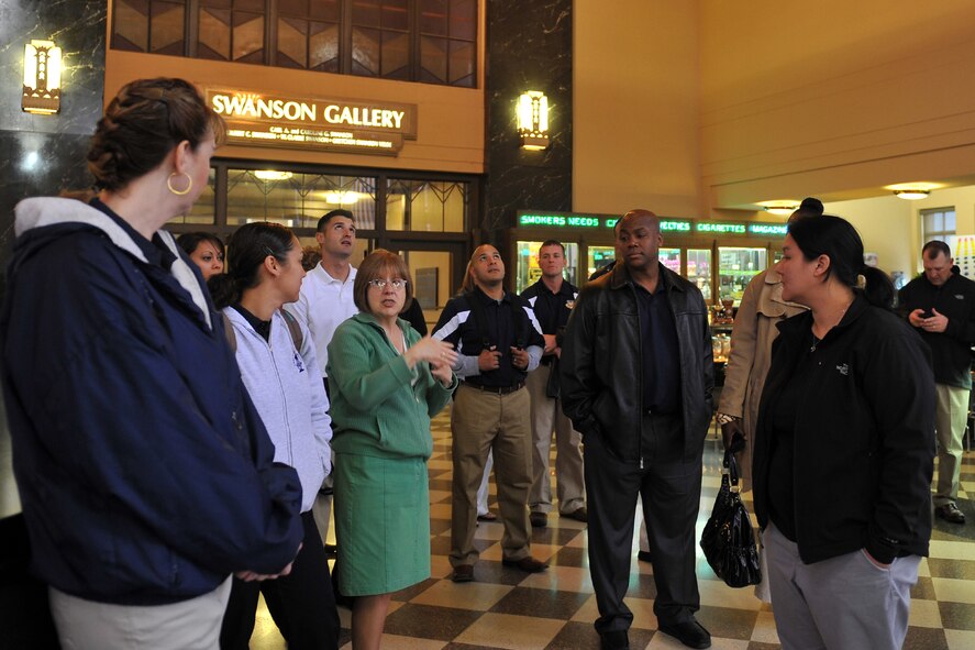 OFFUTT AIR FORCE BASE, Neb. -- Ronda Cox Goldman, a Durham Musem volunteer, guides some nominees from the Air Combat Command Outstanding Airmen of the Year and their family members through a tour of the museum in Omaha, Neb., April 19. The nominees of the Air Combat Command Outstanding Airmen of the Year also toured the Henry Doorly Zoo. 

U.S. Air Force Photo by charles haymond
[RELEASED] by SrA Peter Danielson
