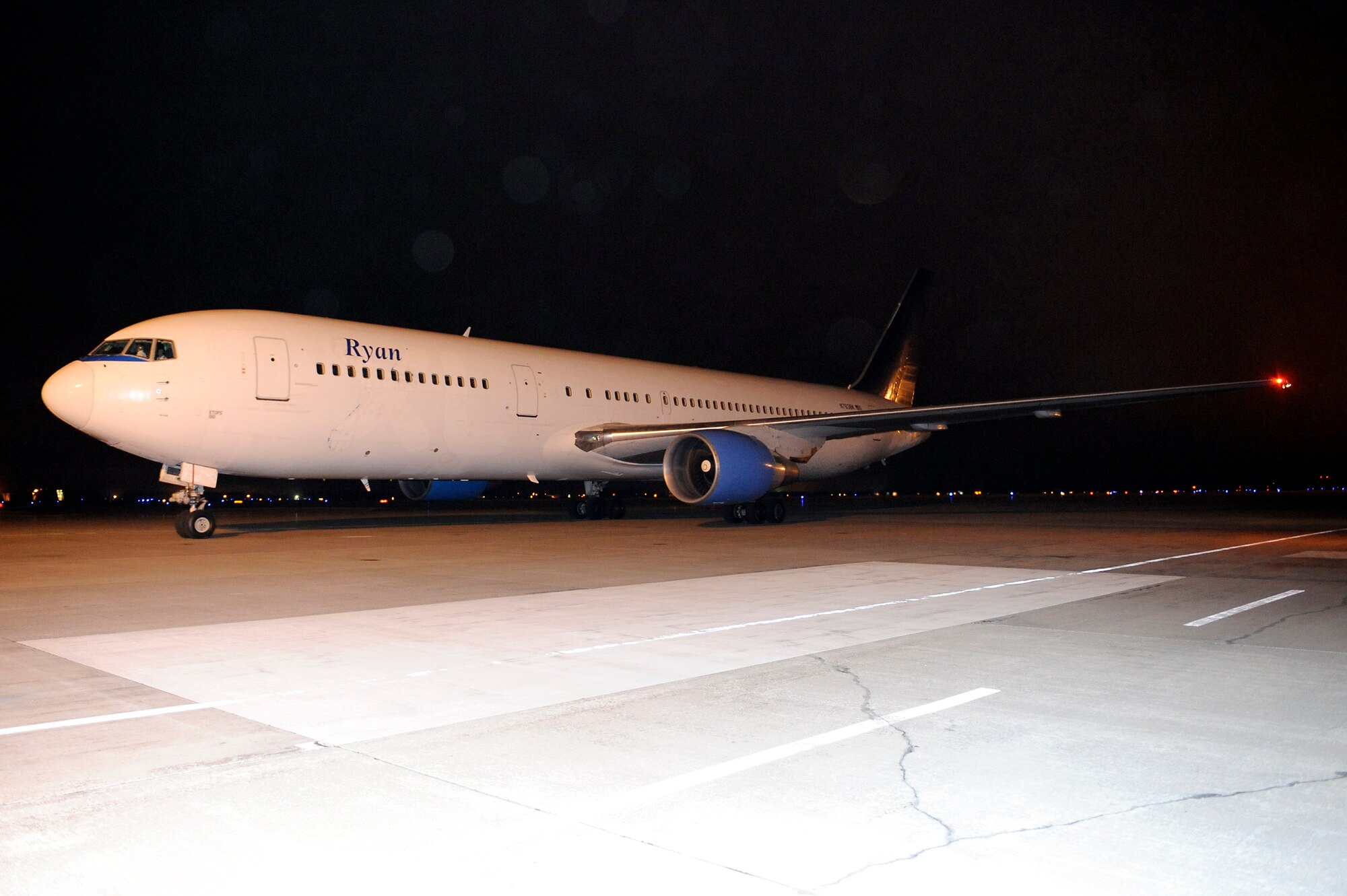 MISAWA AIR BASE, Japan – A Boeing 767 aircraft, dubbed the “patriot express,” arrives 22 April. More than 150 passengers returned to Misawa on the first flight after the voluntary authorized departure order was lifted by the Defense Department 15 April.  (U.S. Air Force photo by Staff Sgt. Marie Brown\Released)