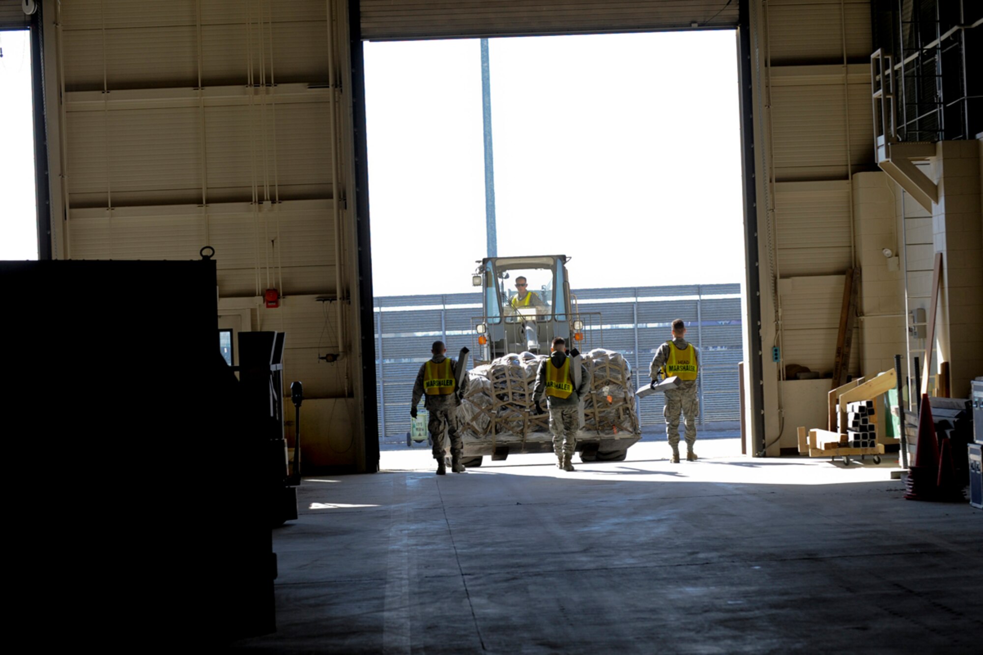 A 463L pallet is prepared readied for shipment overseas during Polar Force. (U.S. Air Force photo/Steve White)