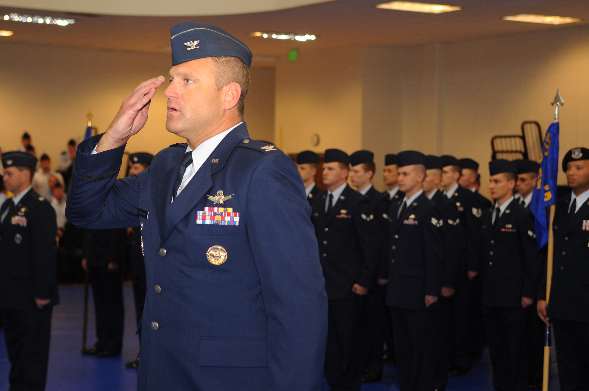 BUCKLEY AIR FORCE BASE, Colo.-- Col. Trent Pickering, incoming 460th Space Wing commander, renders a salute to the  outgoing commander, Col. Clint Crosier (not shown), at a  relinquishment of command ceremony April 25, 2011. (U.S. Air Force photo by Airman Manisha Vasquez)