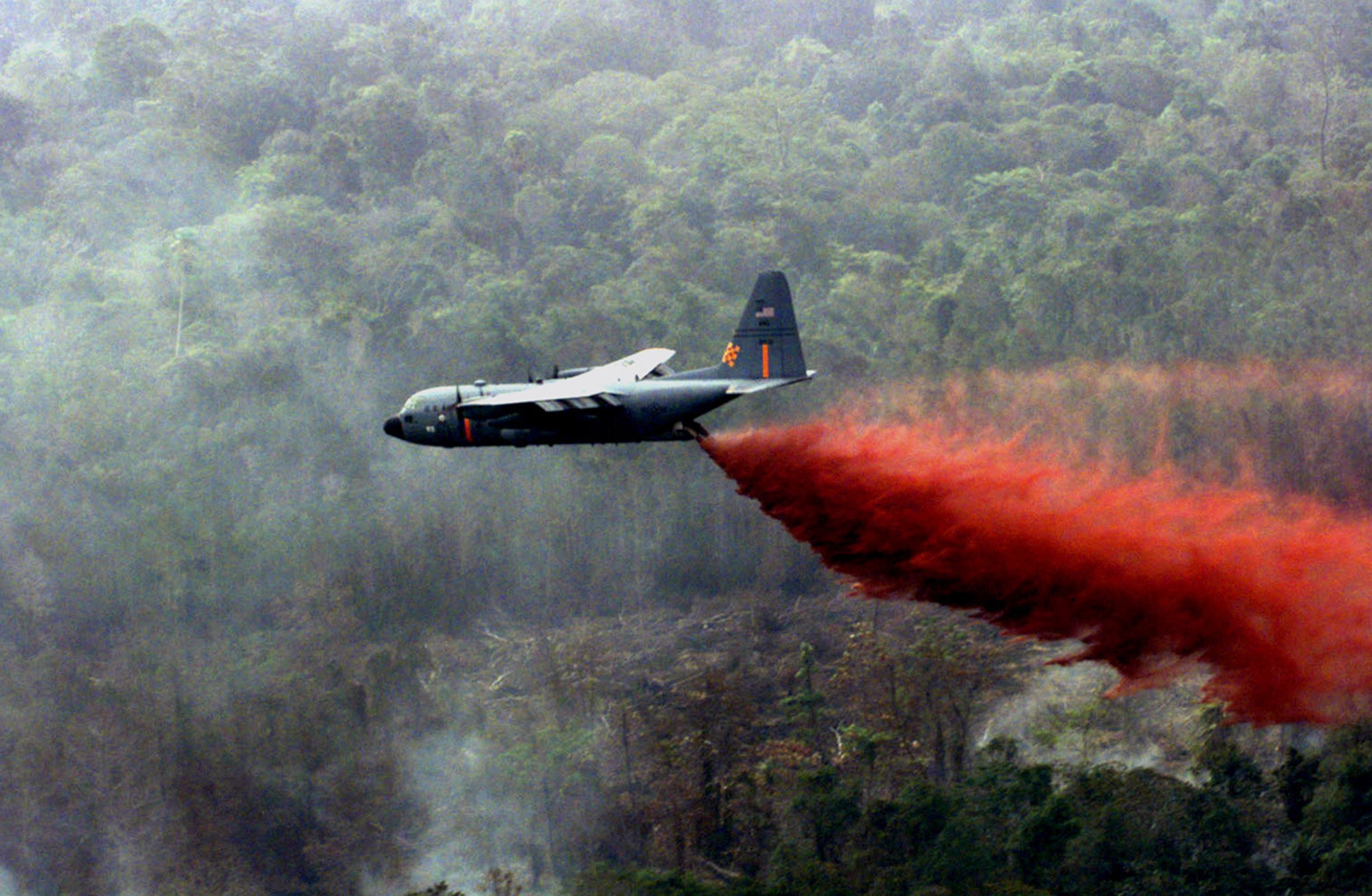 C-130 Hercules aircraft, operated by the 302nd Air Expeditionary Group and equipped with modular airborne fire fighting systems, similar to the one pictured here, have dropped 90,000 gallons of retardant over Texas as of April 25, 2011, to help control the 993,000 acres of burning wildfires. (U.S. Air Force photo/Staff Sgt. Daryl McKamey)