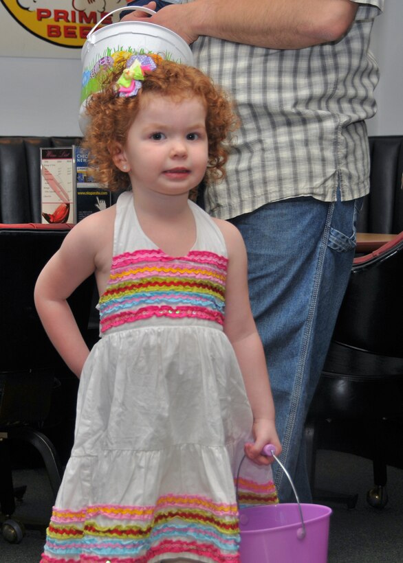 Members of the 914th and 107th Airlift Wings and their families participate in the Children's Easter Egg Hunt at the Niagara Falls Air Reserve Station Falcon Club, April 23, 2010, Niagara Falls NY. The egg hunt was held inside the Falcon Club where candy filled plastic eggs were hidden for the children to find. (U.S. Air Force photo by Staff Sgt. Joseph McKee