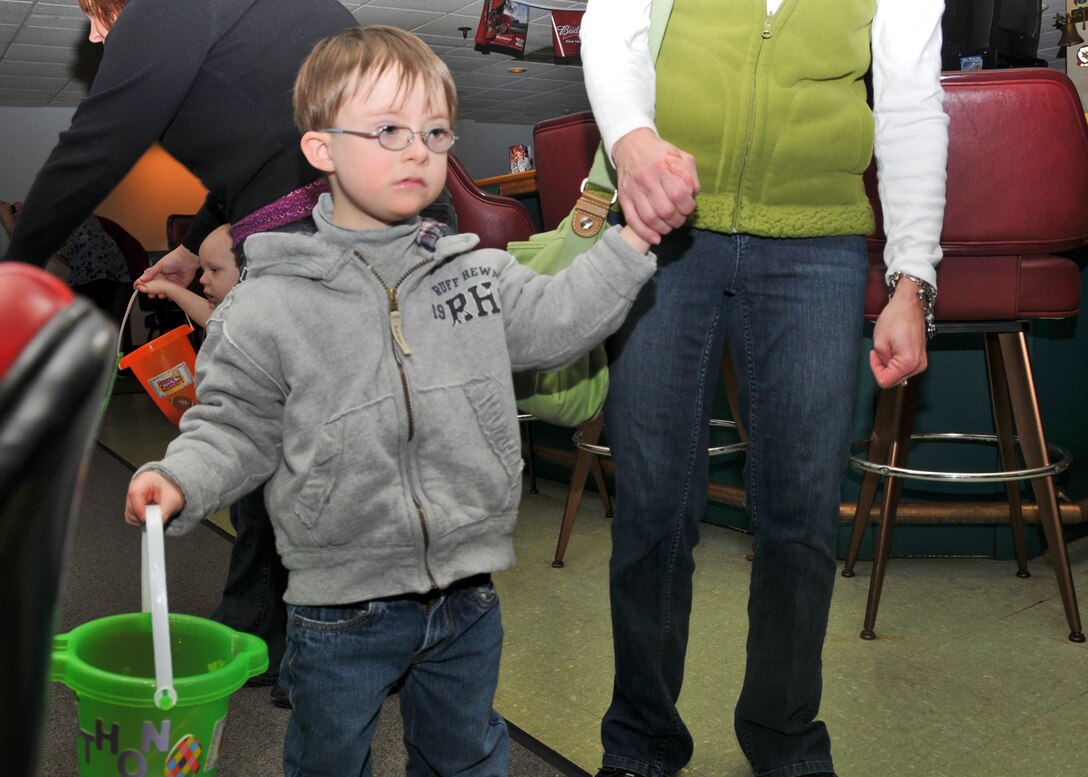 Members of the 914th and 107th Airlift Wings and their families participate in the Children's Easter Egg Hunt at the Niagara Falls Air Reserve Station Falcon Club, April 23, 2010, Niagara Falls NY. The egg hunt was held inside the Falcon Club where candy filled plastic eggs were hidden for the children to find. (U.S. Air Force photo by Staff Sgt. Joseph McKee