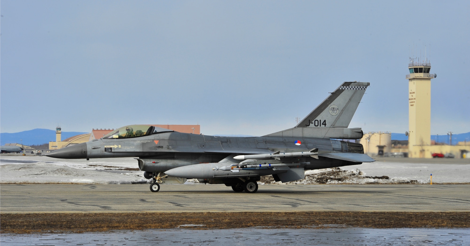 A Royal Netherlands air force F-16A taxis to the runway before conducting a simulated combat sortie over the Joint Pacific Alaska Range Complex during RED FLAG-Alaska, April 21, 2011. The JPARC covers more than 67,000 square miles and enables the military to have the largest air-ground training complex in America. The F-16A is assigned to Leeuwarden Air Base, Netherlands. (U.S. Air Force photo/Staff Sgt. Christopher Boitz)